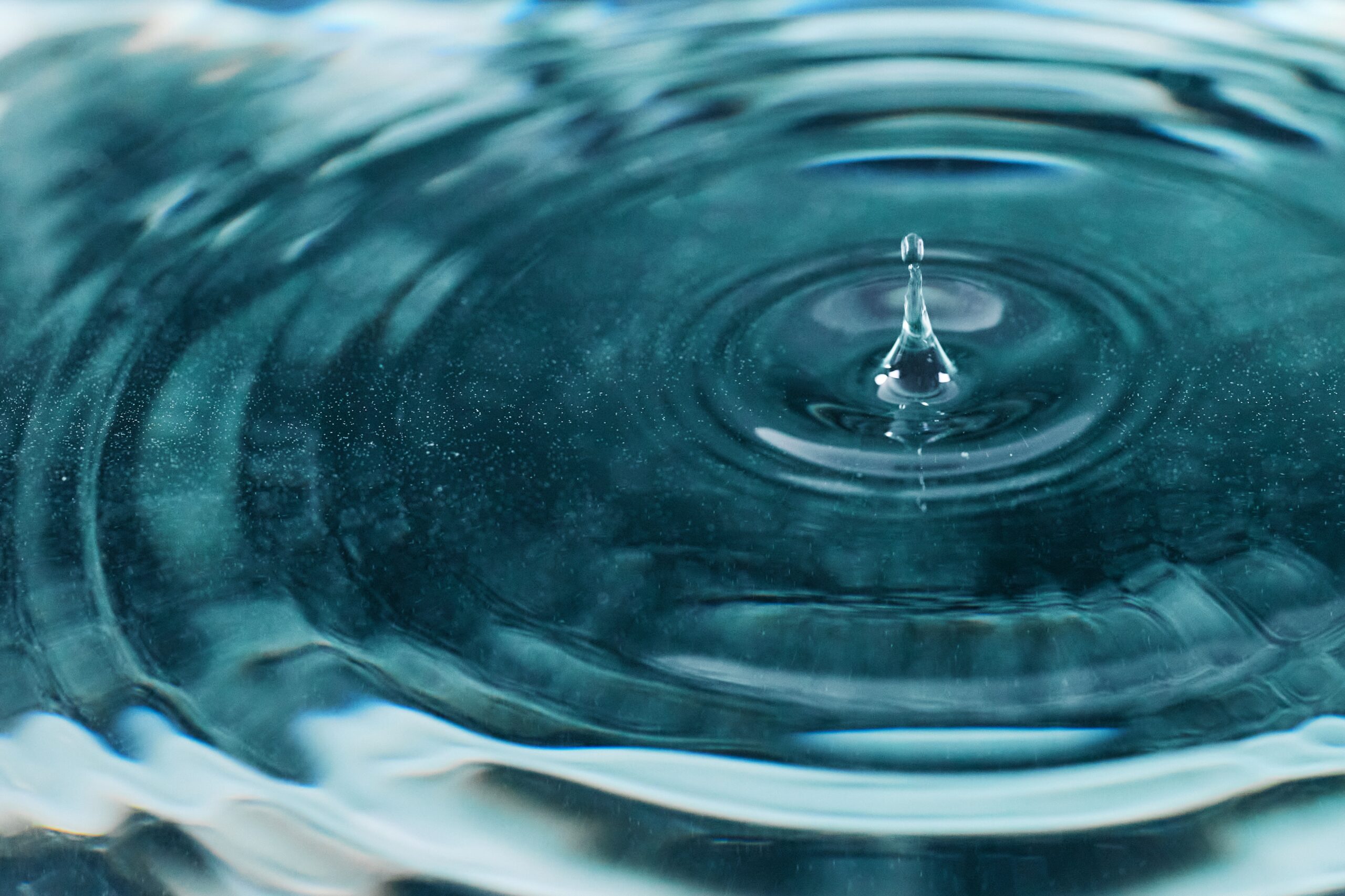 water droplet rippling on the surface